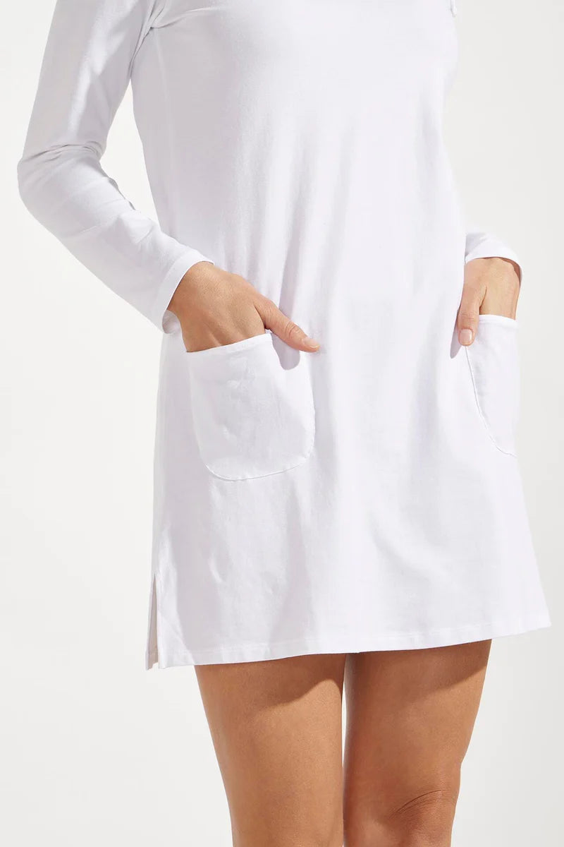 Tunique anti-UV blanche pour femme, manches longues, poches avant, protection solaire UPF50+, idéale pour la plage.