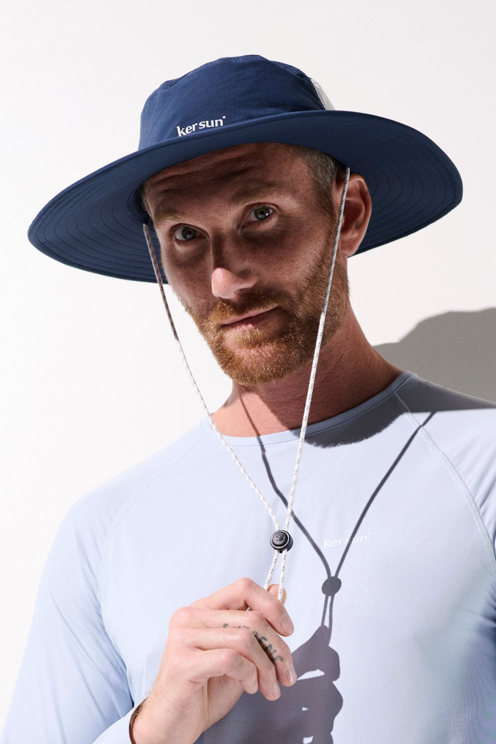 Chapeau anti-UV - Oasis, bleu marine UPF 50+, léger et respirant pour homme, idéal pour activités en extérieur.