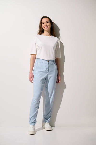 Pantalon anti-UV - Faro bleu clair pour femme, confortable et léger, idéal pour une protection solaire quotidienne.