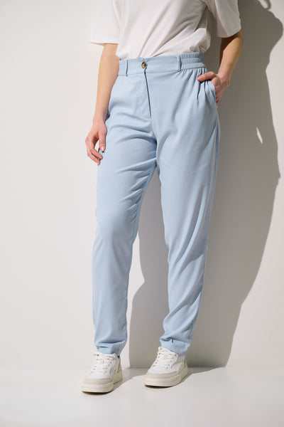 Pantalon anti-UV - Faro bleu clair pour femme, léger et élégant, offrant une protection solaire UPF 50+.