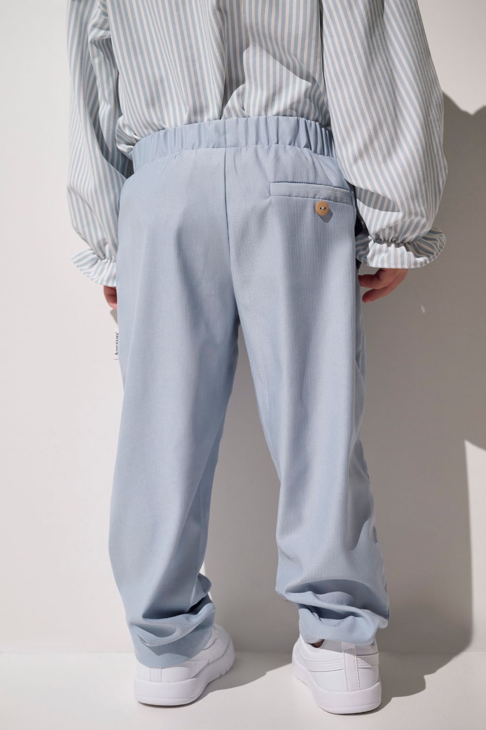 Pantalon anti-UV - Faro bleu pour enfant, léger et élégant, parfait pour une protection solaire en plein air.