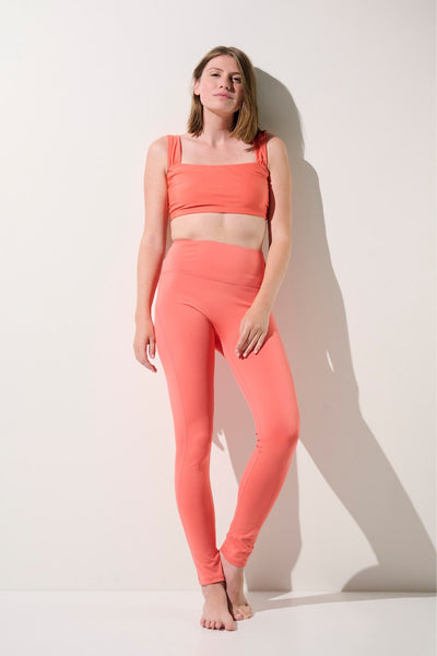Legging de bain anti-UV Galápagos rose pour femme, léger et extensible, idéal pour la protection solaire en activités aquatiques.