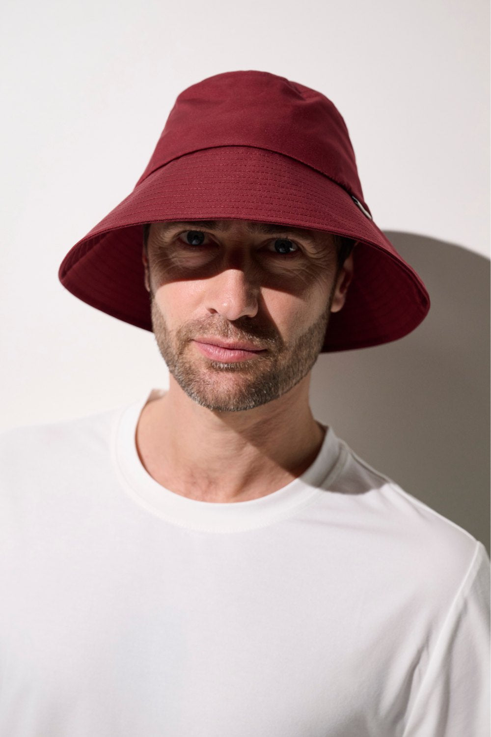 Bob anti-UV - Faro rouge pour homme, léger et pratique, offrant protection solaire UPF 50+.