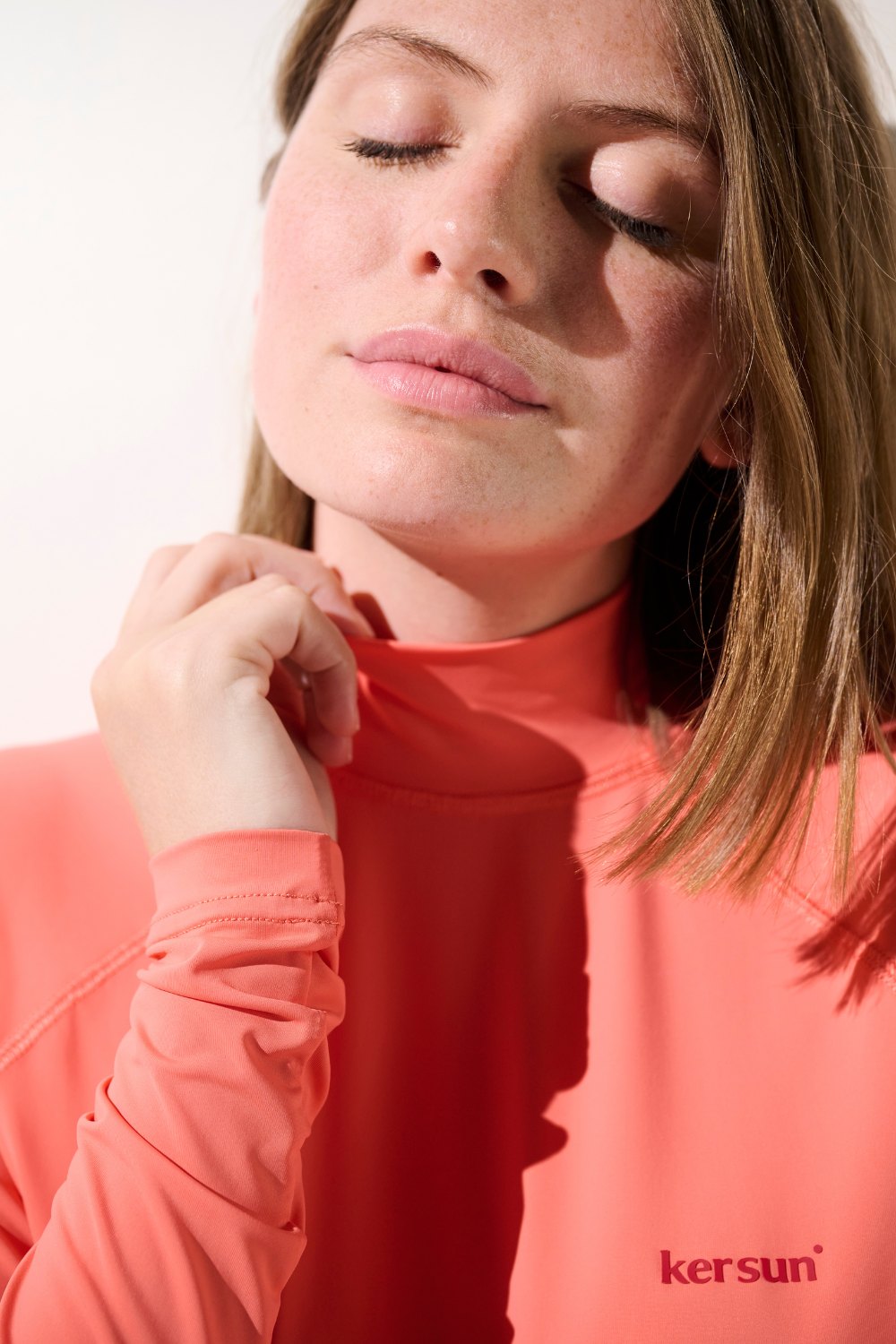 T-shirt de bain anti-UV - Malibu en corail pour femme, confortable et léger, idéal pour la protection solaire.