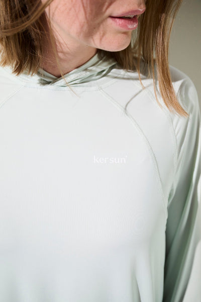 T-shirt anti-UV à capuche - Oasis pour femme, tissu léger et respirant, couleur vert clair, protection solaire UPF 50+.