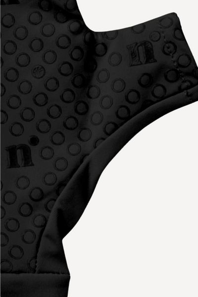 Mitaines anti-UV noires pour femme, offrant confort et adhérence, protection solaire UPF50+.