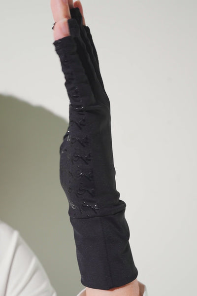 Mitaines anti-UV Mojave noires pour femme, offrant protection solaire UPF 50+ et confort pour activités extérieures.
