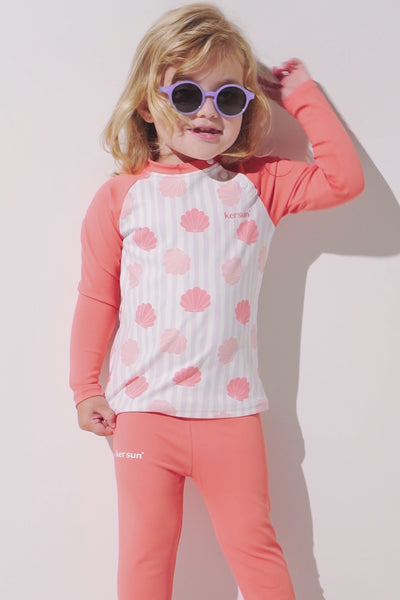 Legging de bain anti-UV - Samoa pour fille, coloris corail, avec t-shirt anti-UV UPF 50+ et lunettes de soleil.